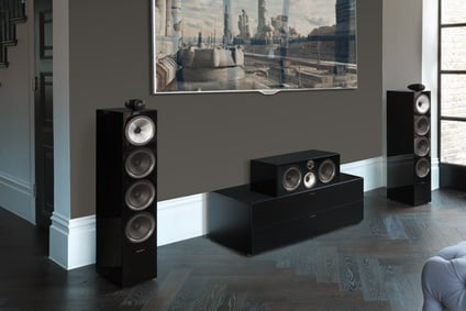 700 series set up in a living room with two tower speakers and center channel