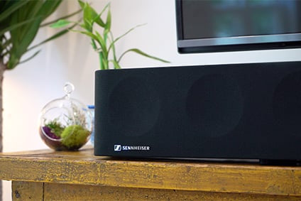 close up shot of the sennheiser ambeo soundbar under a TV