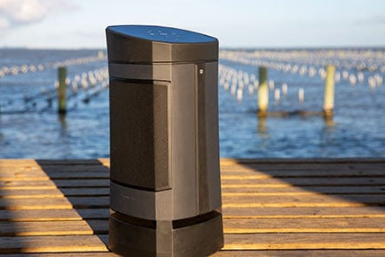 vg5 speaker sitting by a lake