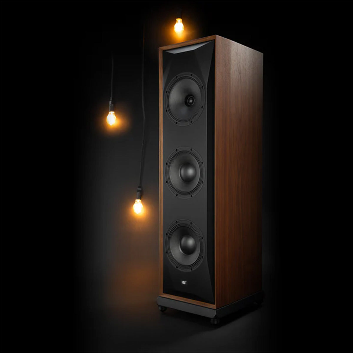 MoFi SourcePoint 888 Floorstanding Speakers - single walnut speaker angled left on dark background with lightbulbs