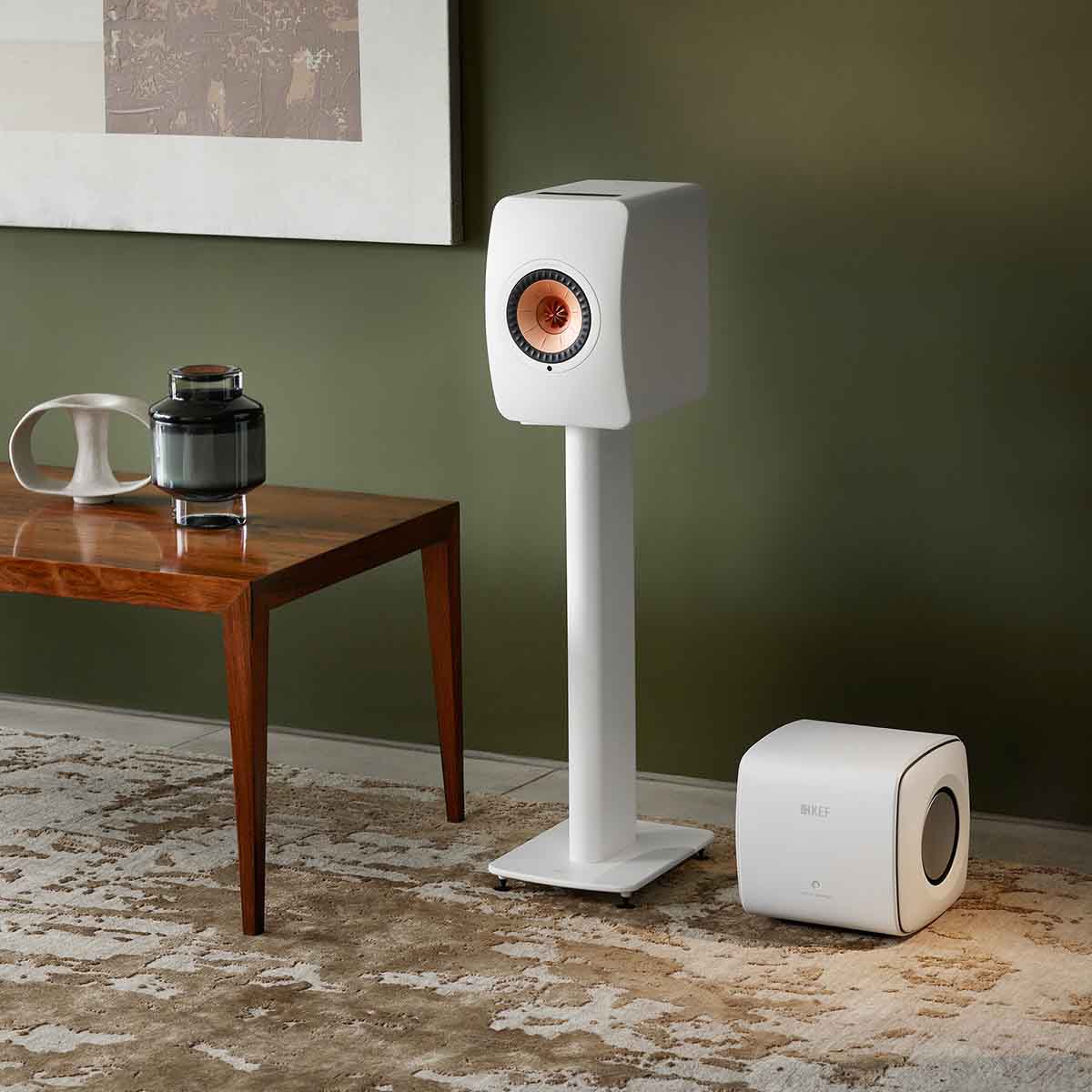 KEF KC62 Subwoofer - Mineral White - in room next to LS50 speaker on stand