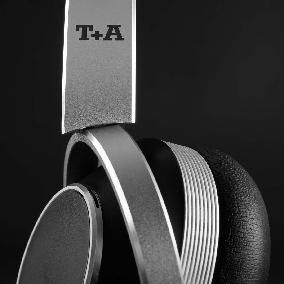 T+A Solitaire T High-Performance Closed-Back Dynamic Headphones - Black - detail of T+A logo