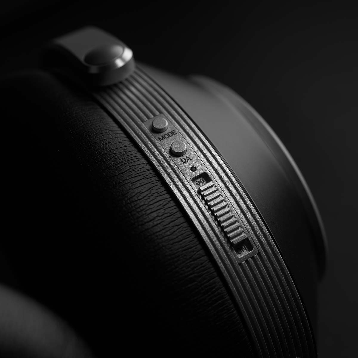 T+A Solitaire T High-Performance Closed-Back Dynamic Headphones - Black - detail of earphone showing buttons