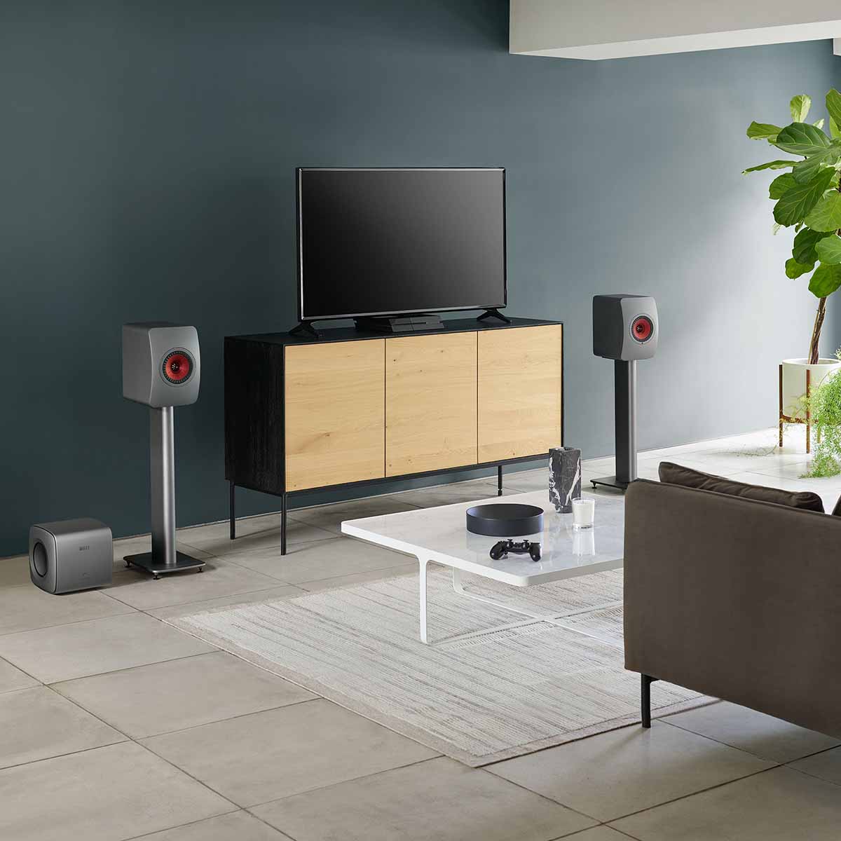 KEF KC62 Subwoofer - Titanium - with LS60W and TV on entertainment stand