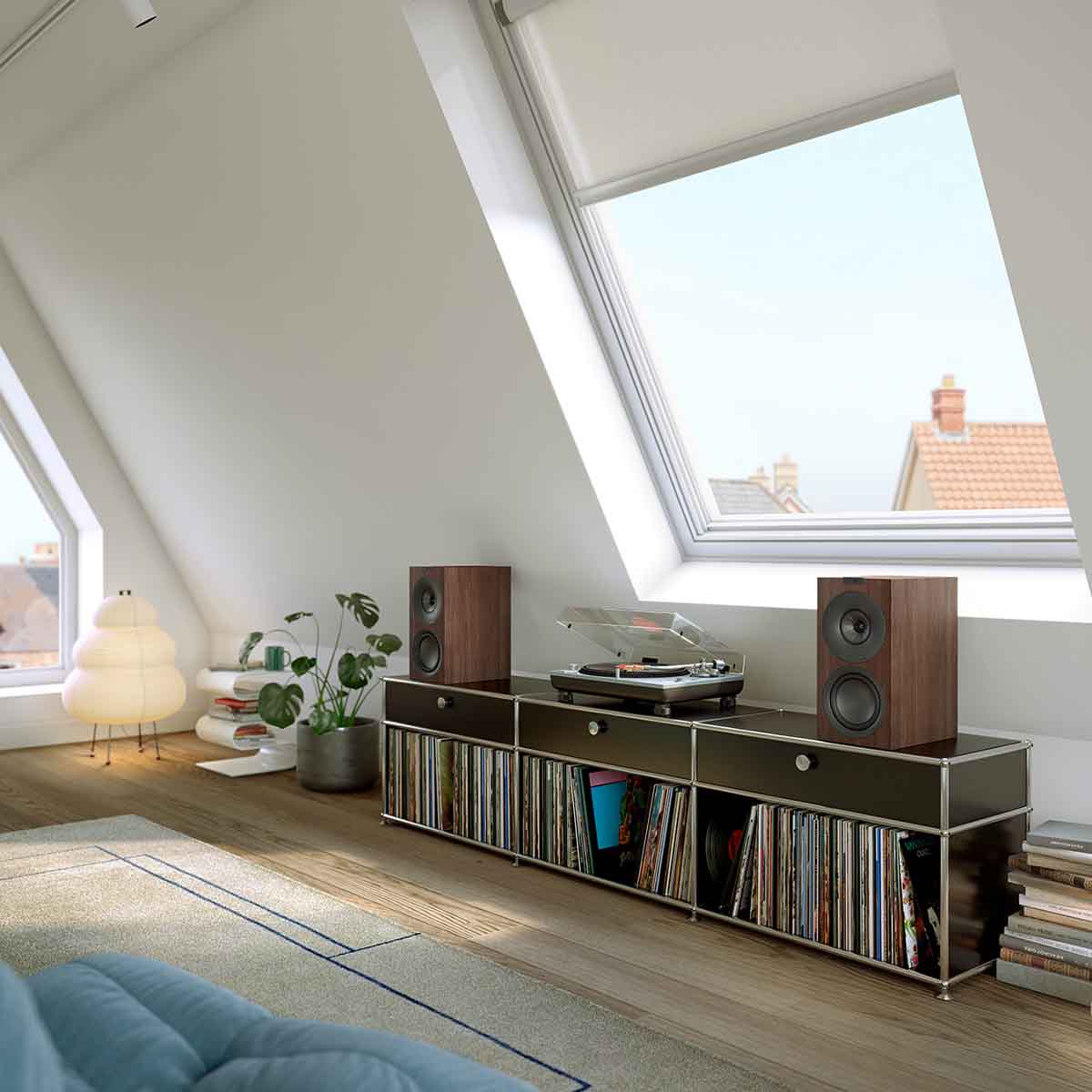 KEF Q Concerto Meta Bookshelf Speakers - Pair side view on media cabinet