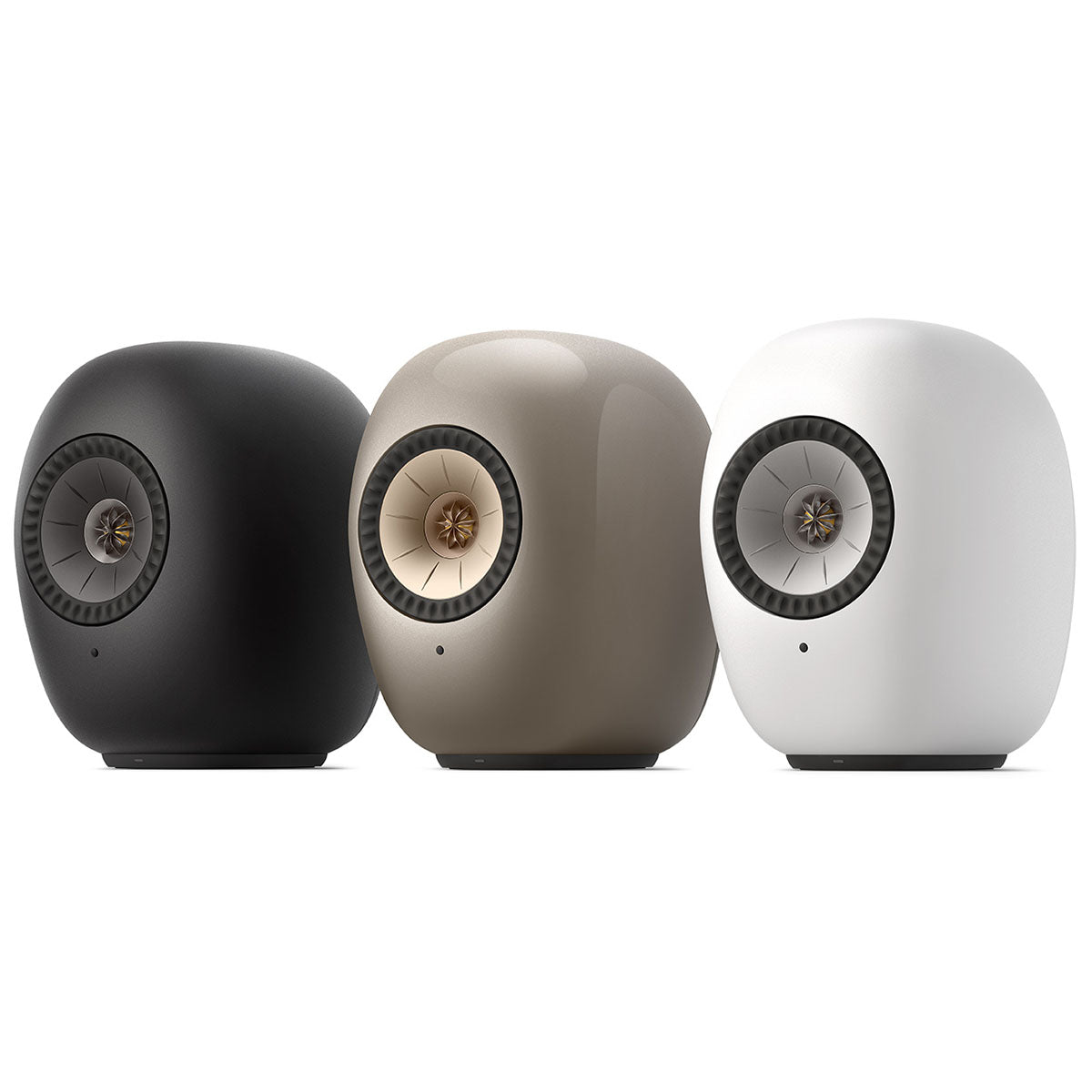 KEF LS Luxe Wireless HiFi Speakers - three speakers angled left, from left to right black, tan, white