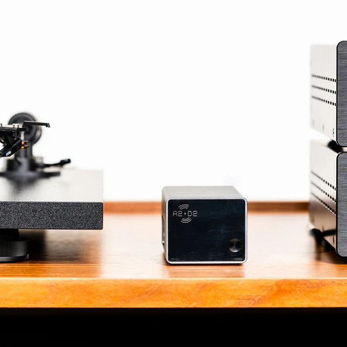 A2D2 Stream Analog-to-Digital Converter and Wi-Fi Streamer closeup on cabinet next to turntable