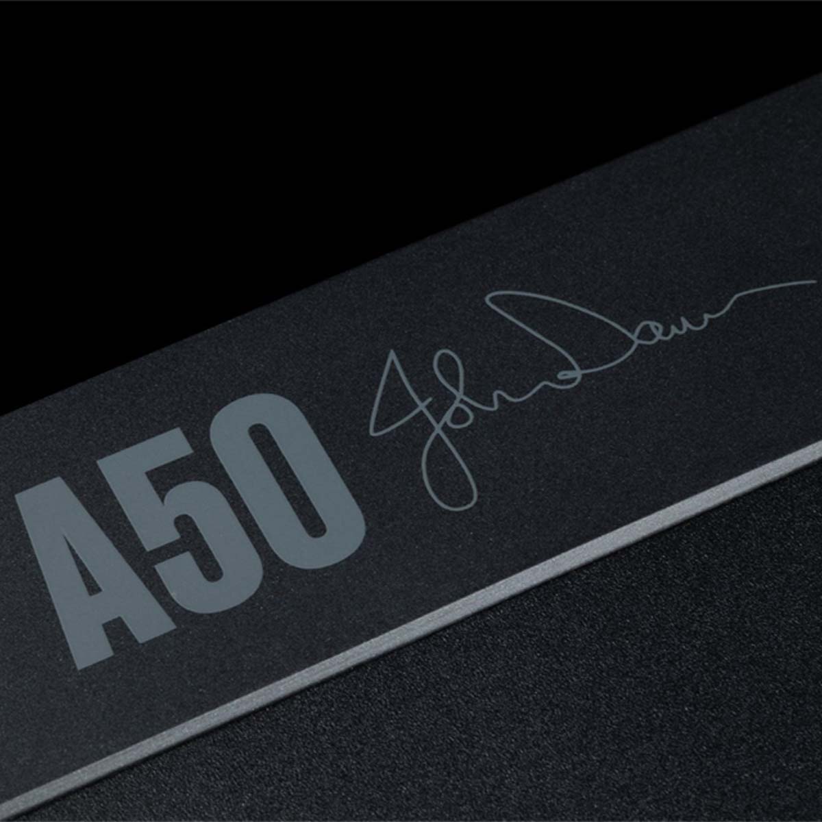 Arcam A50 Signature Stereo Integrated Amplifier close up of logo