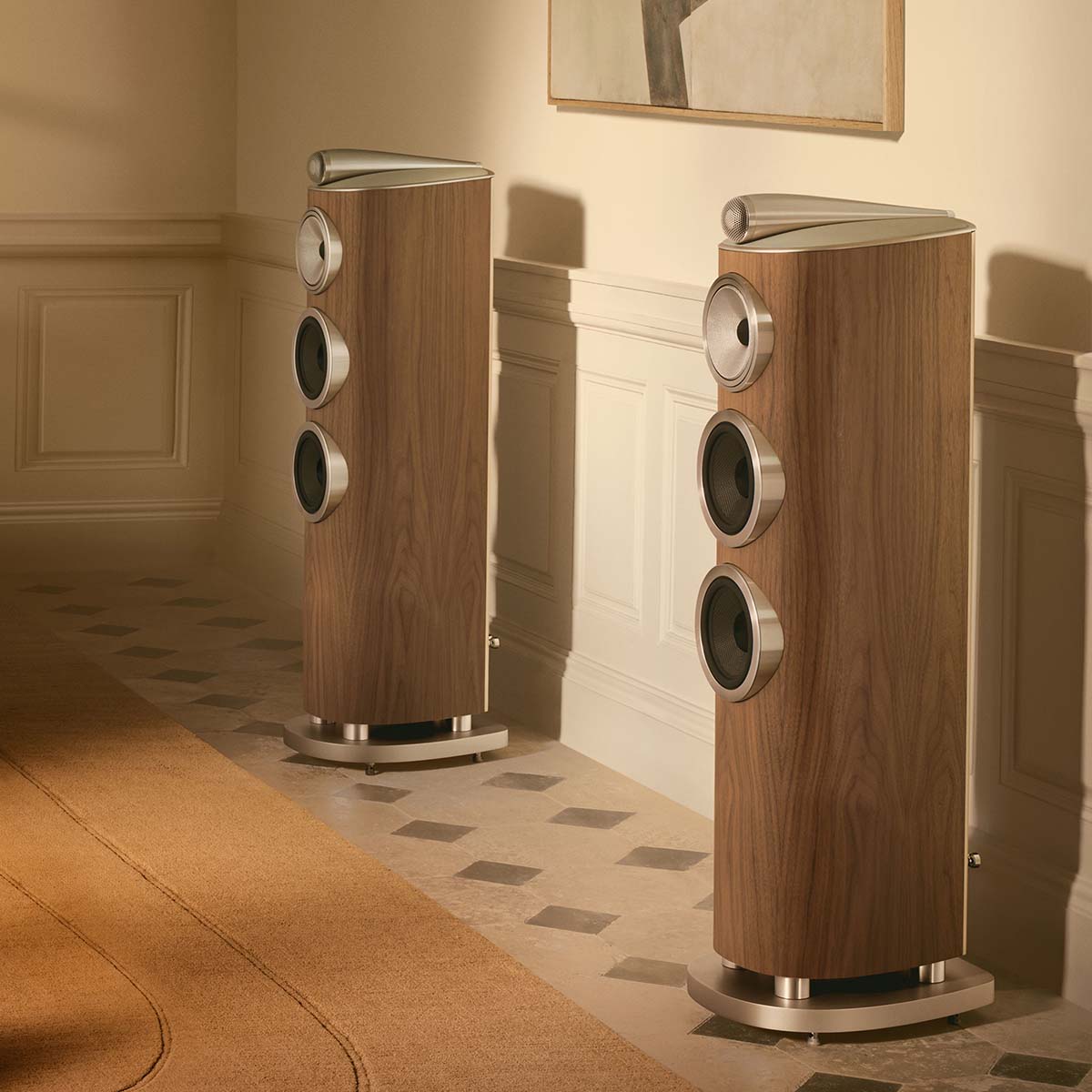 Bowers & Wilkins 804 D5 Floorstanding Loudspeaker - lifestyle photo of pair of Light Walnut speakers facing left in a living room