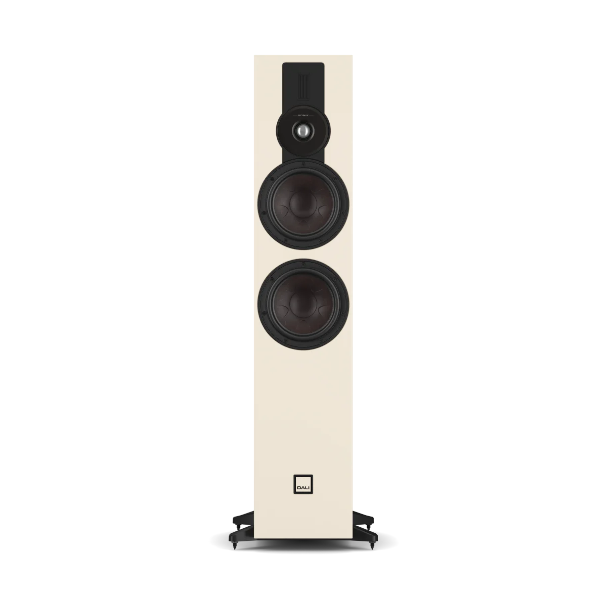 A tall, narrow Dali Sonik 7 floorstanding speaker in a warm cream or off-white finish with prominent black drivers and a small logo badge near the bottom, shown against a plain white background.