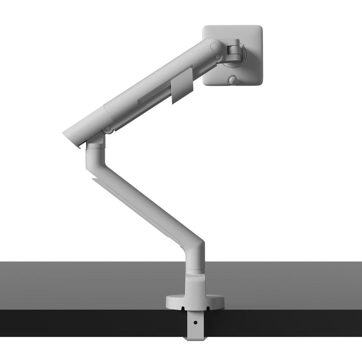White adjustable monitor arm on a white background