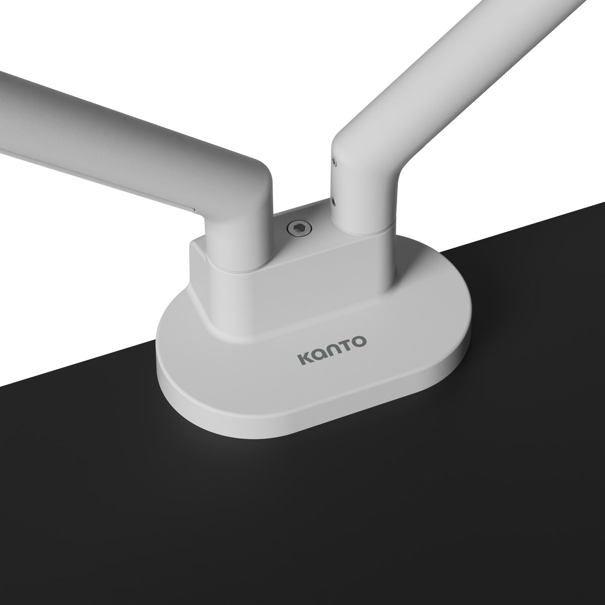 White double-armed desk lamp on a black surface with 'Kanto' branding.