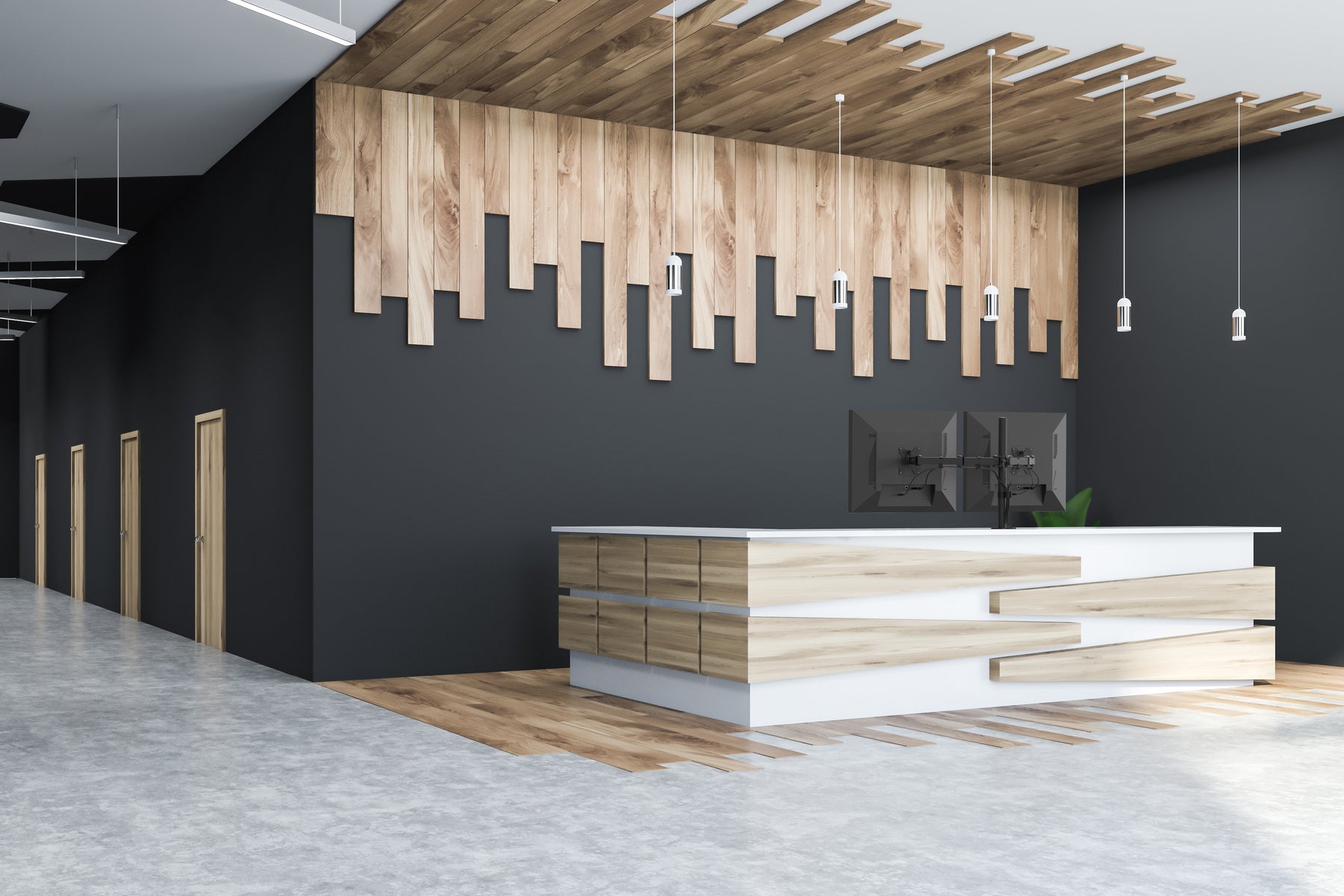 Modern interior design with a reception desk and wooden wall art.