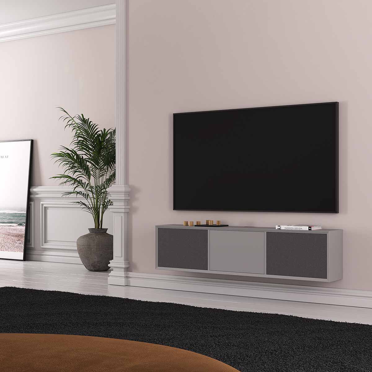 Lyngdorf CS-2 Speaker lifestyle shot front view of two units in cabinet below TV with cabinet door grilles closed