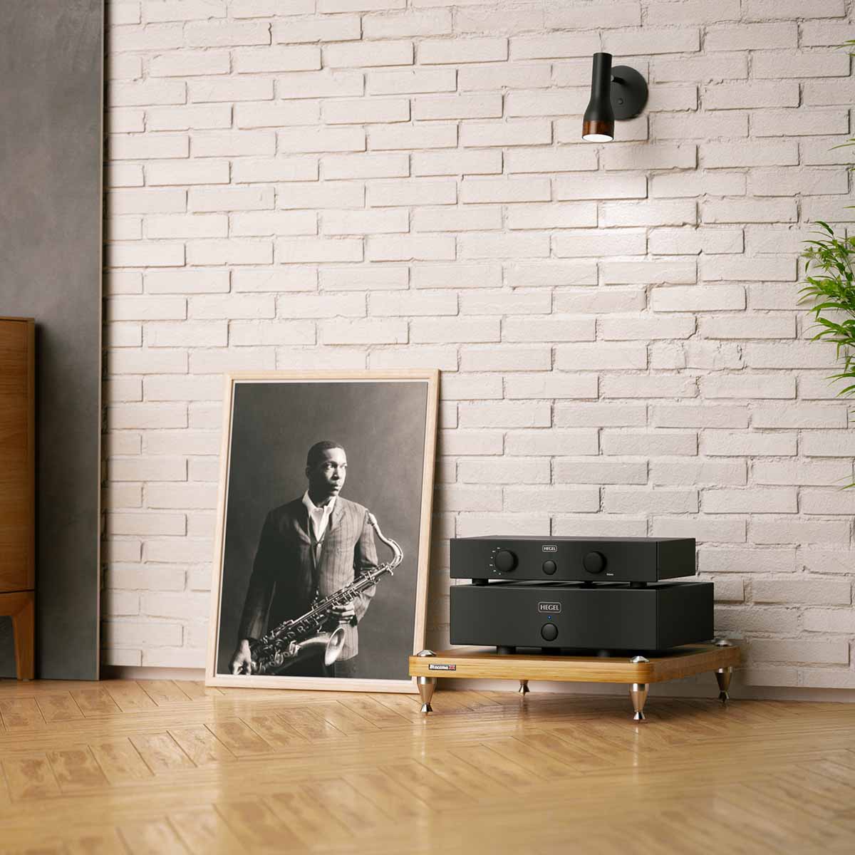 Hegel P20 Stereo Preamplifier front view angled right stacked on Hegel H20 on hifi rack in front of brick wall