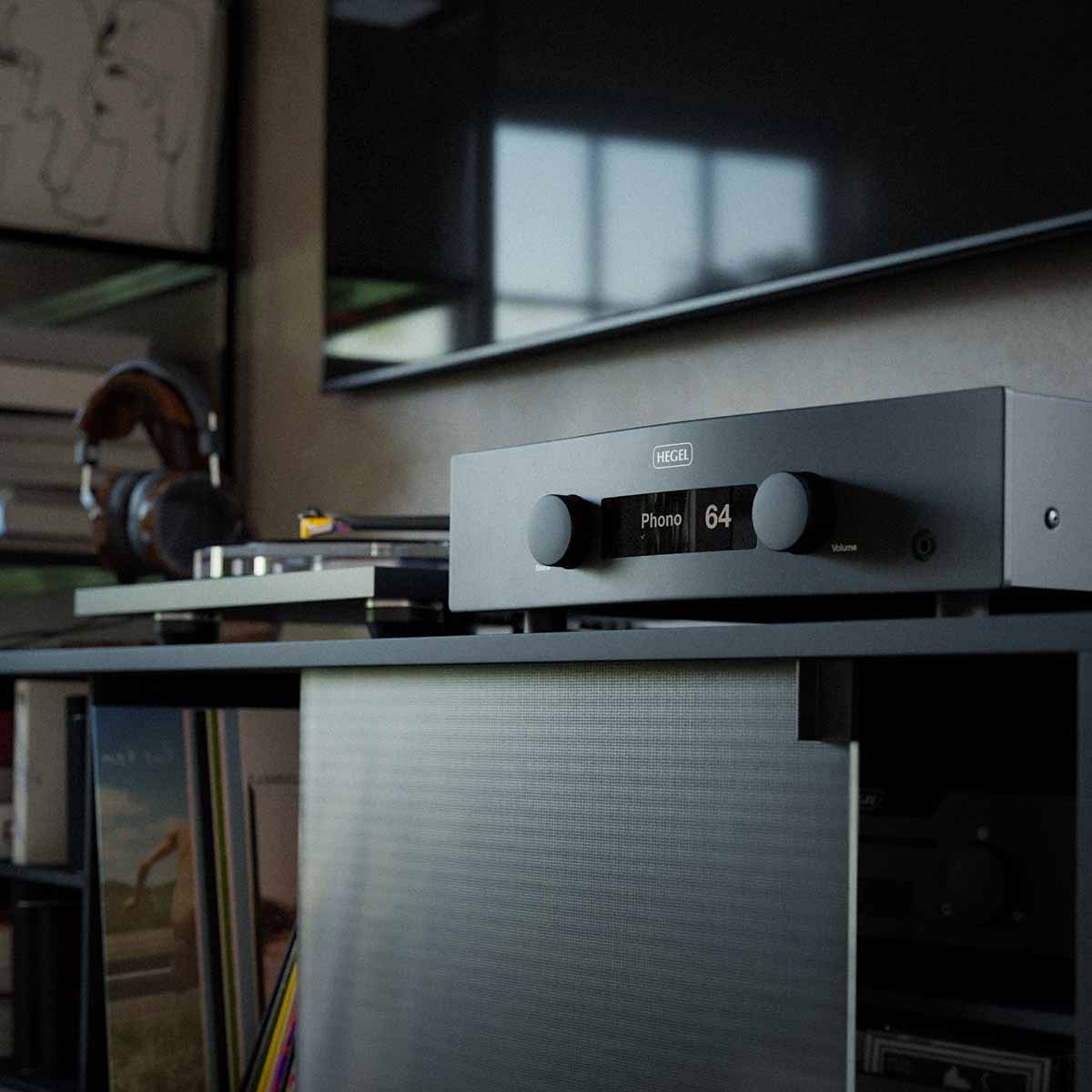 Hegel H190v Integrated Amplifier - black - front view angled right close-up lifestyle shot of unit on cabinet