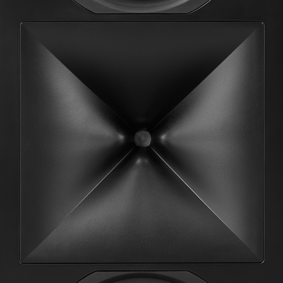 Close-up of a black speaker cone with a central driver