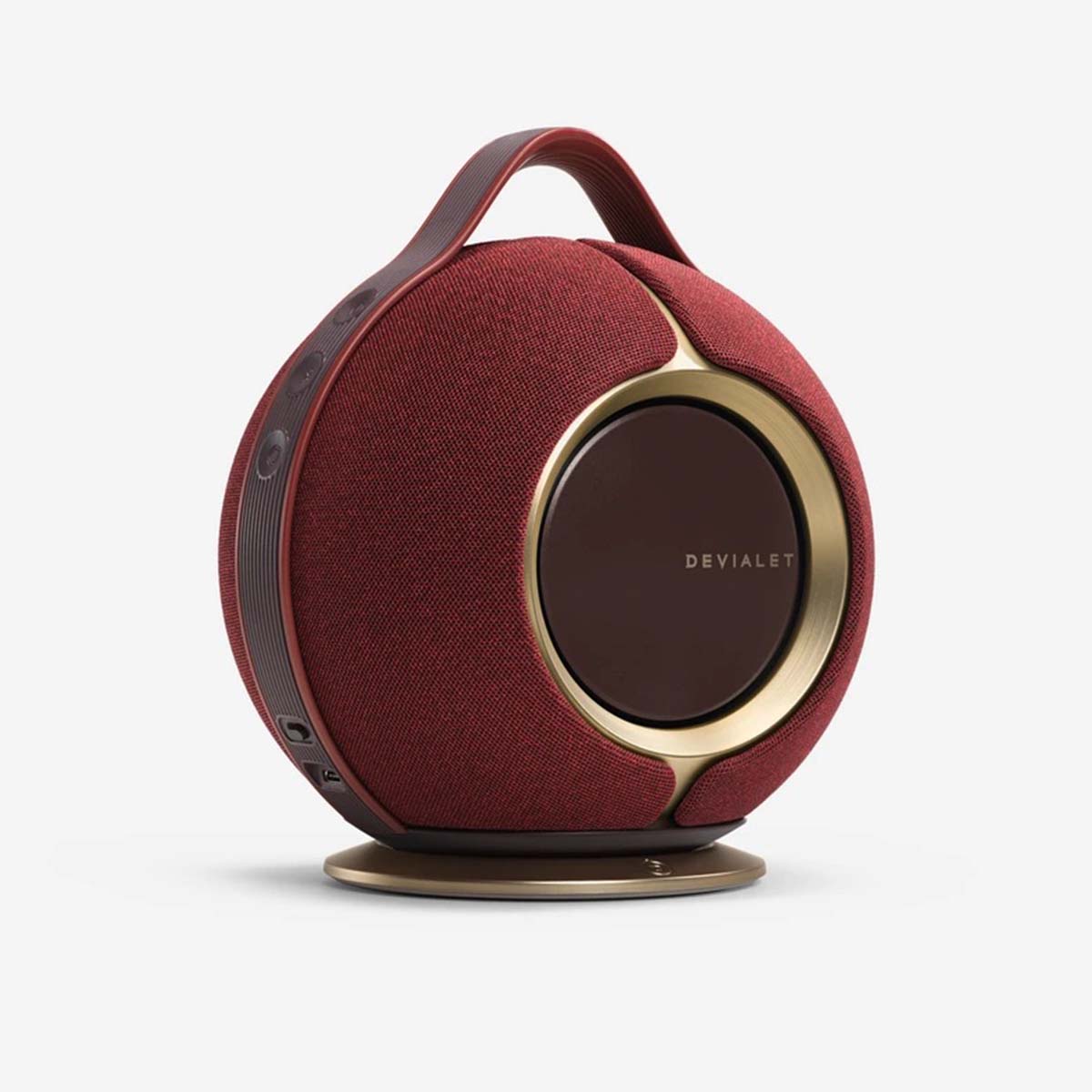 Devialet Mania HiFi Portable Smart Speaker - Opera Rouge front view angled right on charger