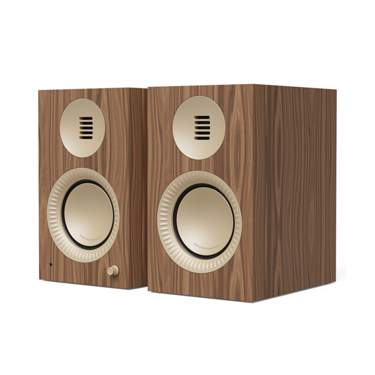 A pair of Kanto TUK Gen 2 260W Premium Powered Speaker System with walnut wood-grain fronts and cream-colored drivers and grille surrounds, shown on a plain white background.