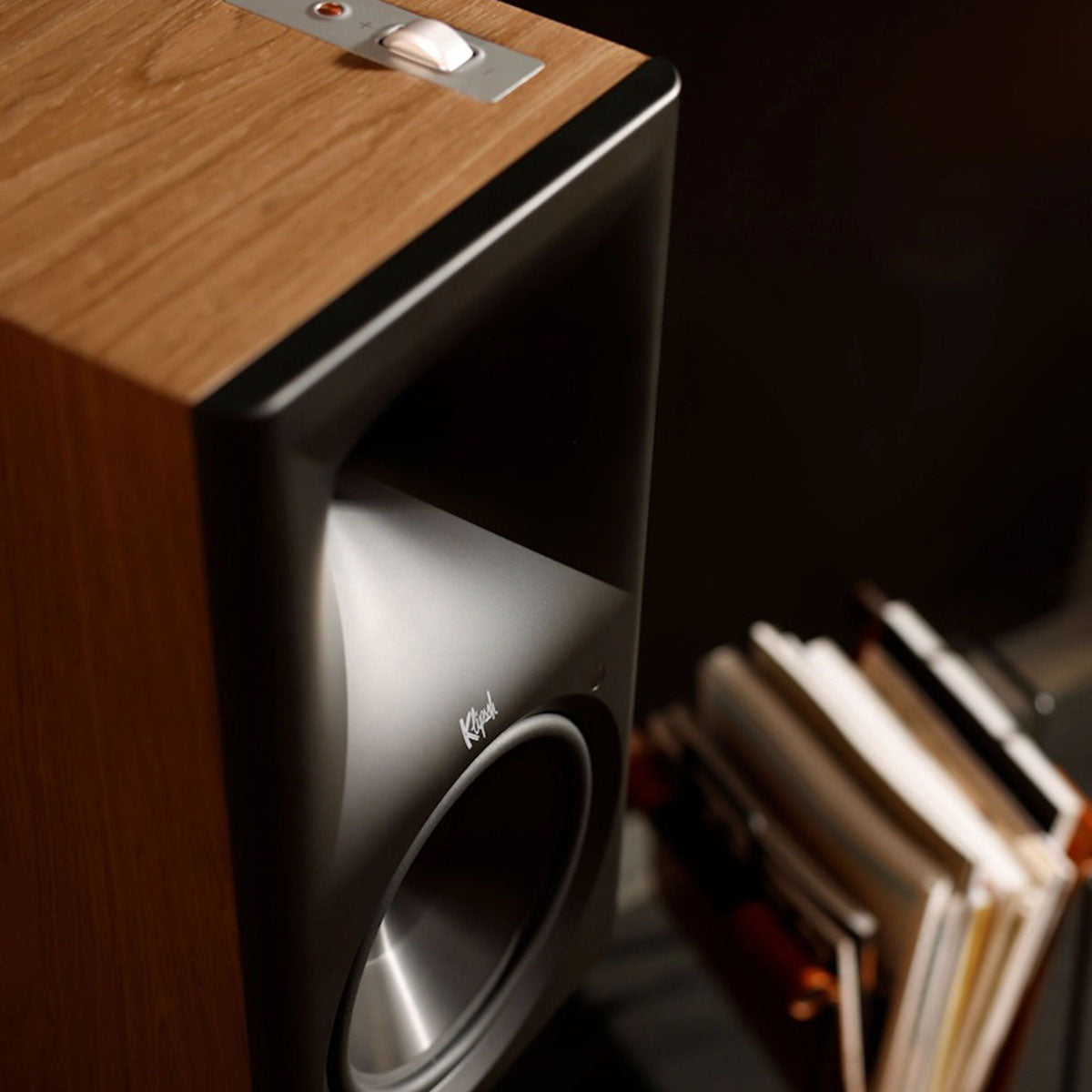 Klipsch The Nines II Dolby Atmos 8" Powered Speakers - single speaker - lifestyle photo closeup of Walnut speaker