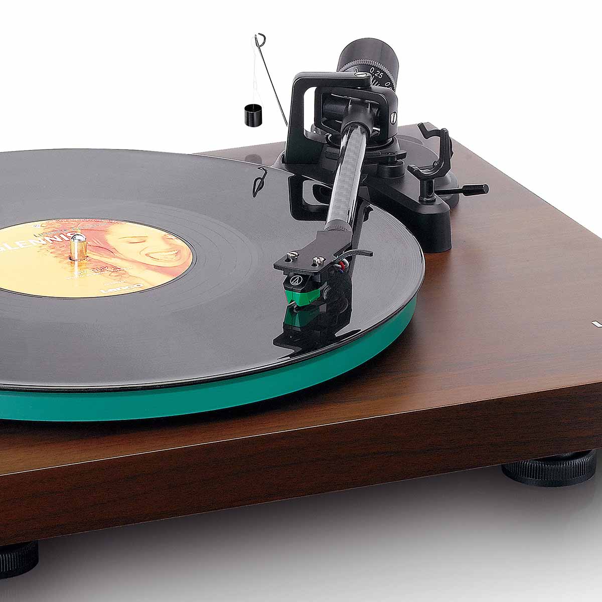 Lenco LBT-225 Bluetooth Turntable w/ Glass Platter and AT-VM95E Cartridge close up high angle front view angled right with record on platter tonearm engaged and no dustcover