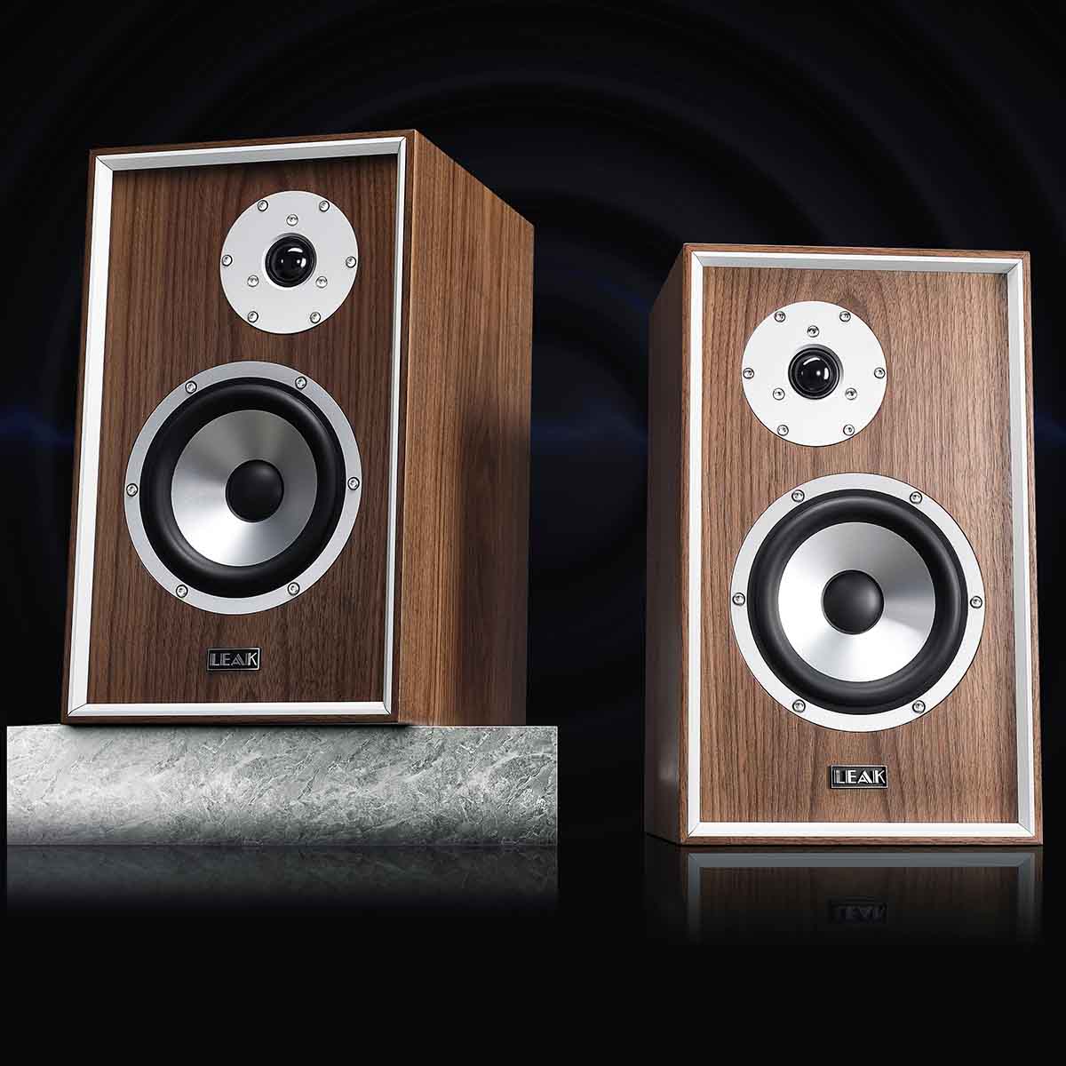 Leak Audio Sandwich 150 Bookshelf Loudspeakers - Walnut - pair of speakers side by side without grille dark background