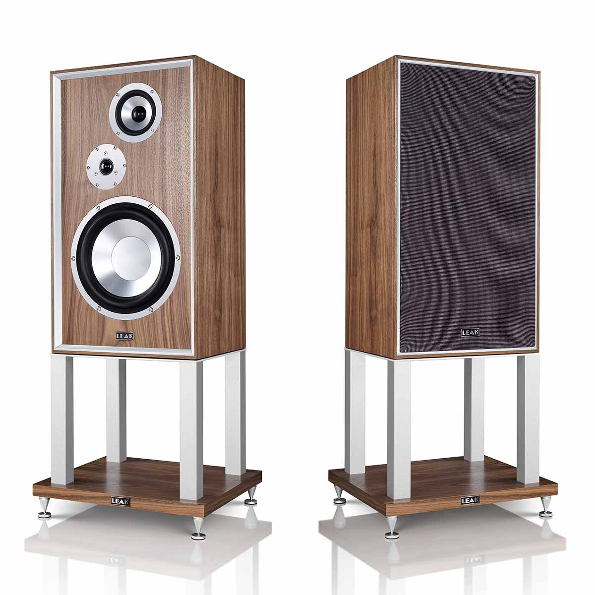 Leak Audio Sandwich 250 Standmount Loudspeakers - Walnut - With Stands - pair of speakers angled outward, left speaker without grille, right speaker with grille