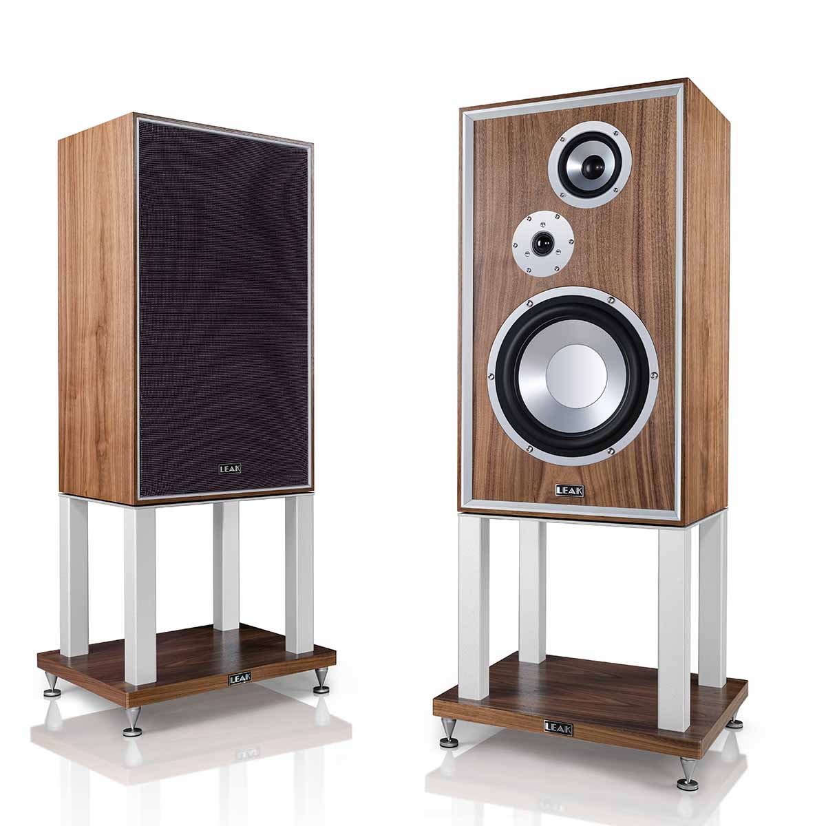 Leak Audio Sandwich 250 Standmount Loudspeakers - Walnut - With Stands - pair of speakers angled inward, left speaker with grille, right speaker without grille