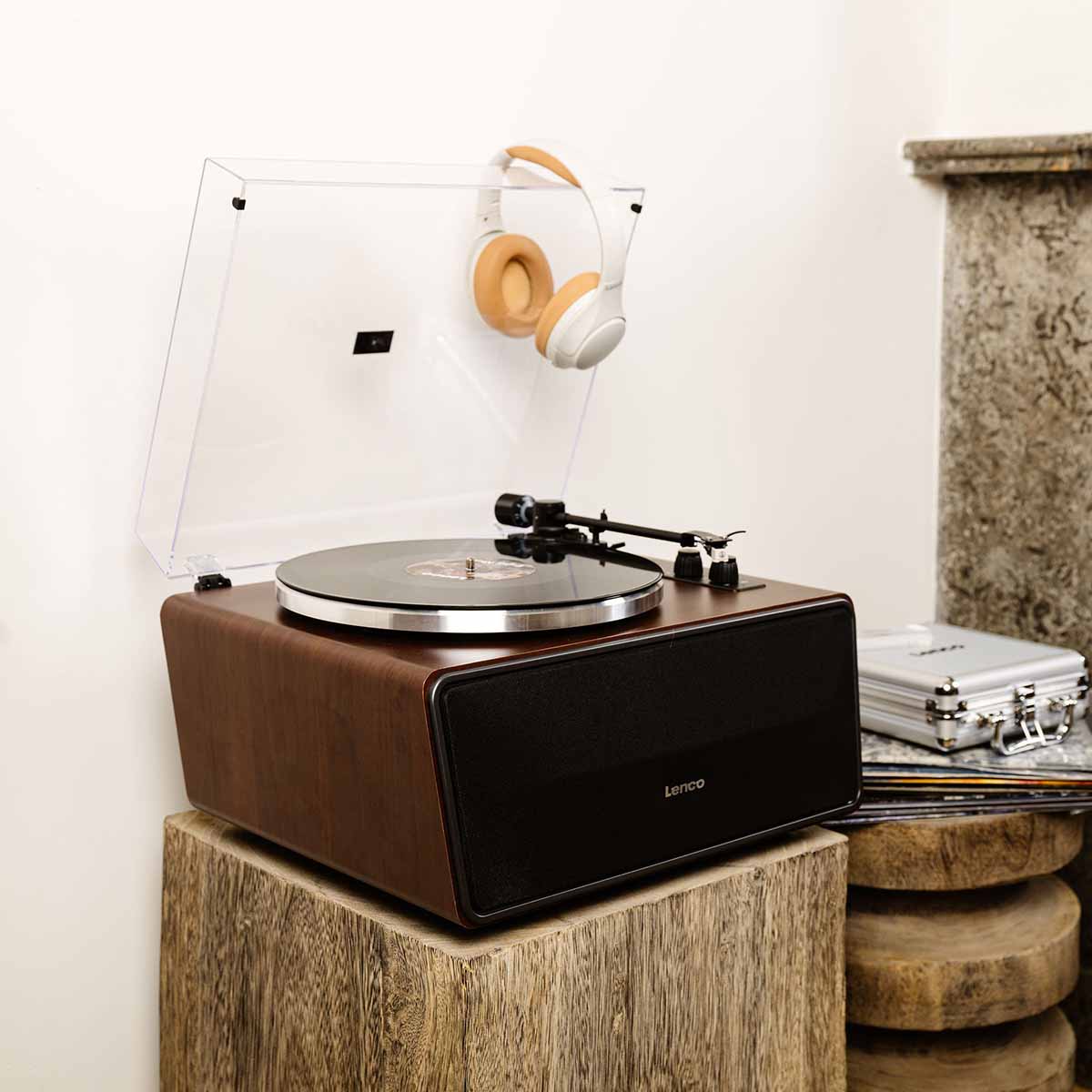 Lenco LS-470 Turntable w/ 80W Speaker System and Bluetooth lifestyle shot front view angled right unit on plinth with headphones hanging on open dustcover