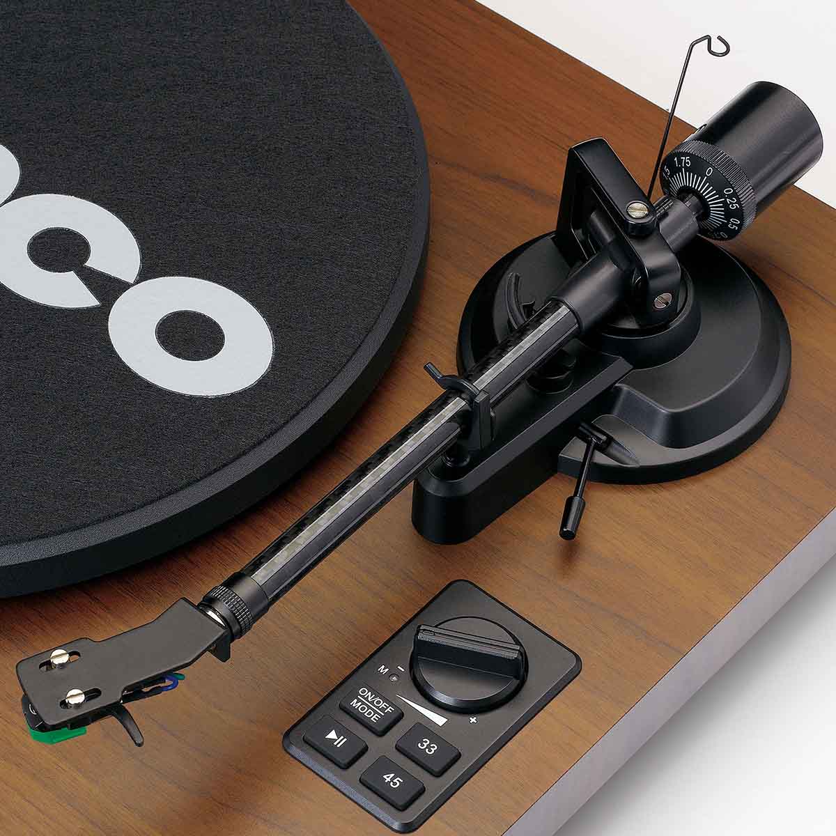 Lenco LS-600 Turntable w/ Built-In Amplifier, Bluetooth, and Speakers closeup of right side of unit showing tonearm and control buttons