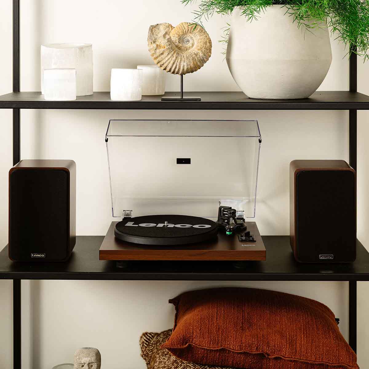 Lenco LS-600 Turntable w/ Built-In Amplifier, Bluetooth, and Speakers front view lifestyle shot of unit and speakers on shelf