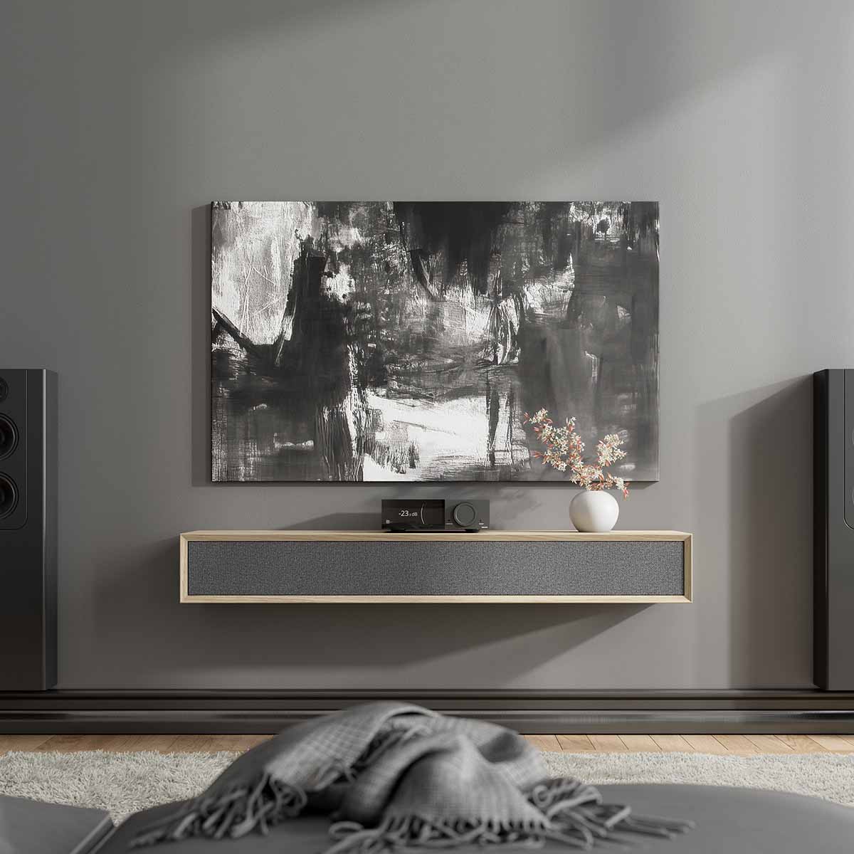 Lyngdorf TDAI-2210 Streaming Integrated Amplifier with RoomPerfect lifestyle shot of unit on shelf below painting