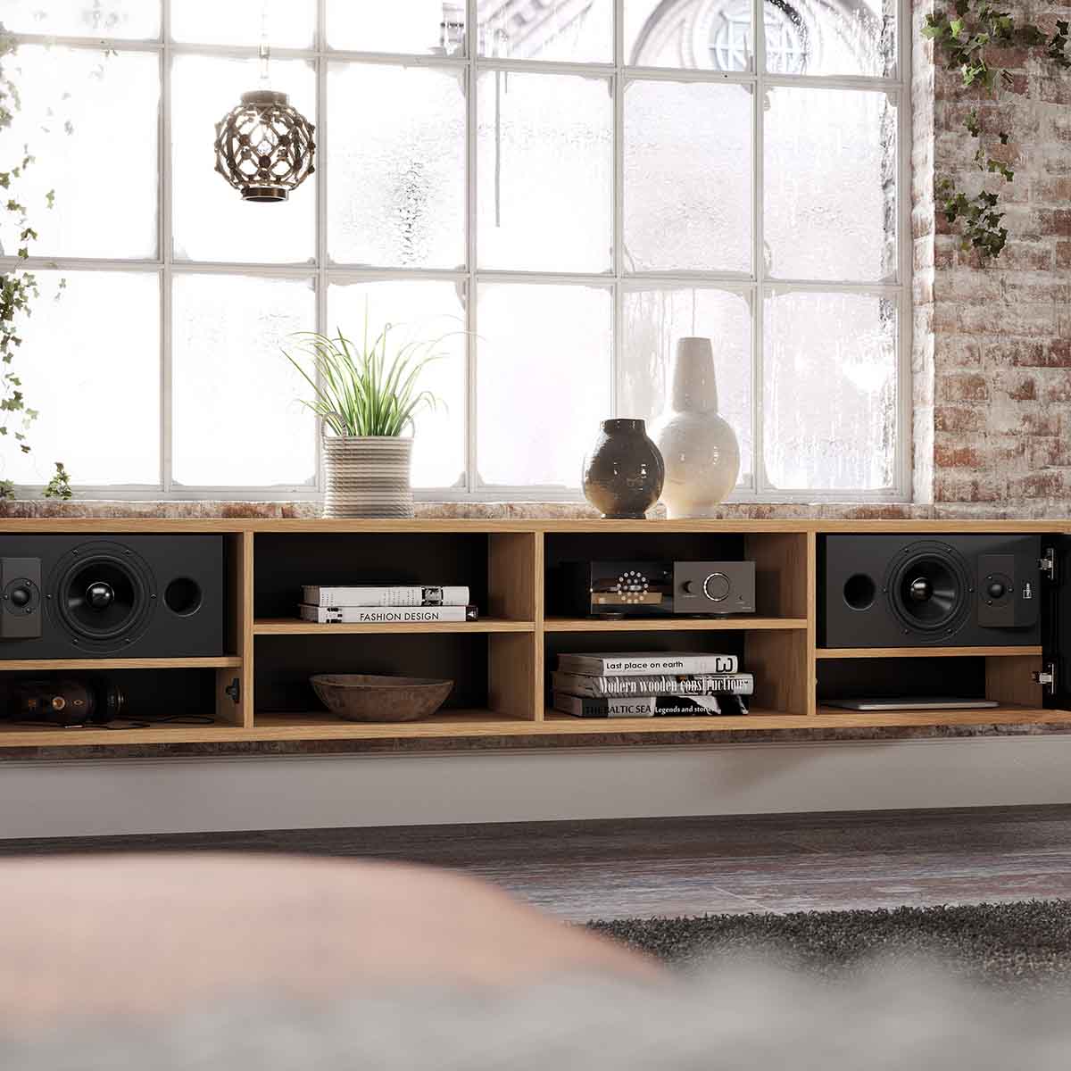 Lyngdorf TDAI-1120 Compact Streaming Amplifier with RoomPerfect lifestyle shot of unit on shelf