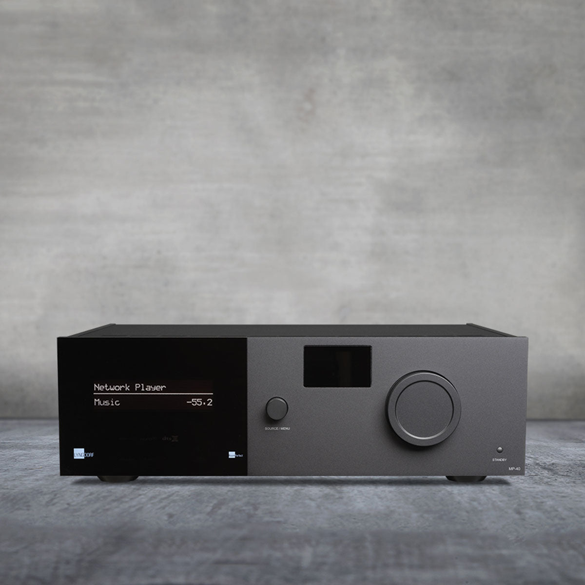Lyngdorf MP-40 2.1 Immersive Surround Processor front view lifestyle view on gray background