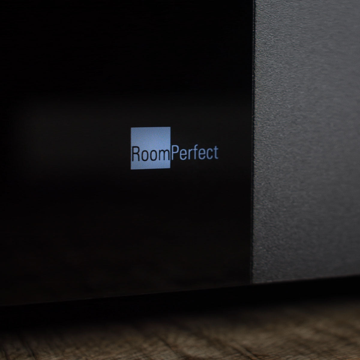 Lyngdorf MP-40 2.1 Immersive Surround Processor front view detail of RoomPerfect logo