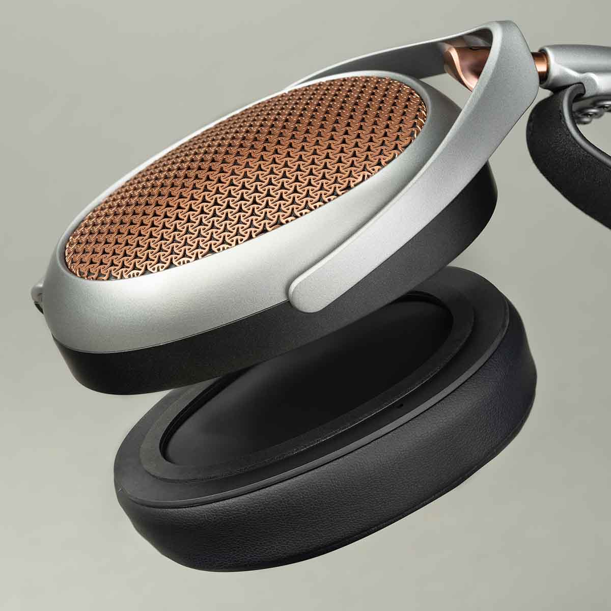 Meze Audio Poet High-Performance Planar-Magnetic Headphones detail showing single earphone with removable pad