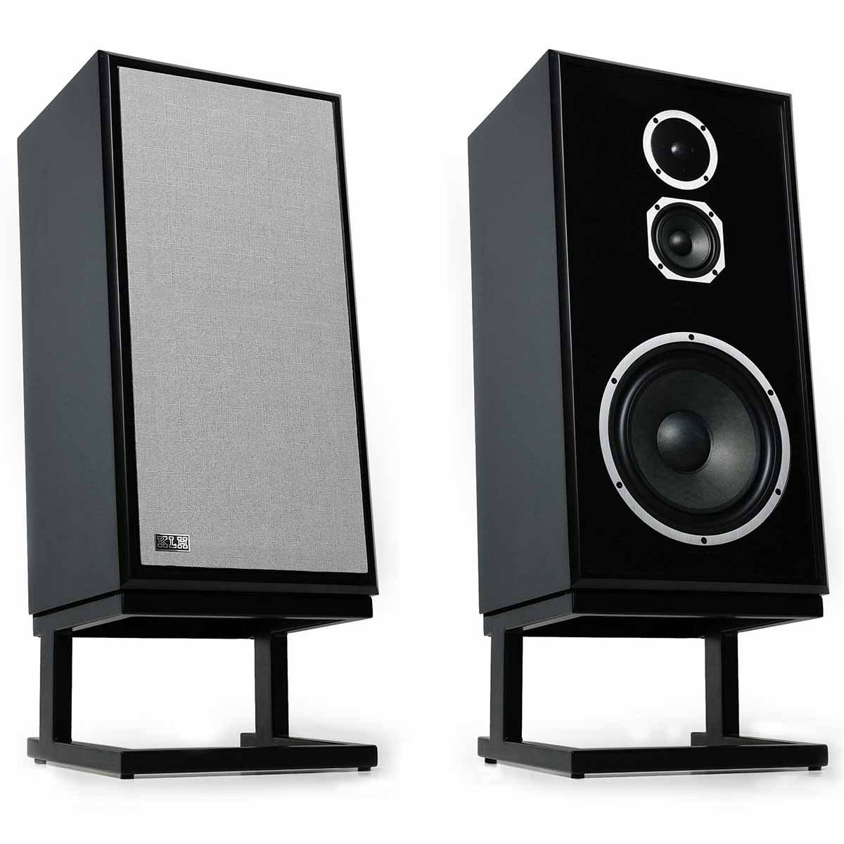 KLH Model Five Acoustic Suspension Loudspeakers - pair of black speakers angled right, left speaker with grille, right speaker without grille