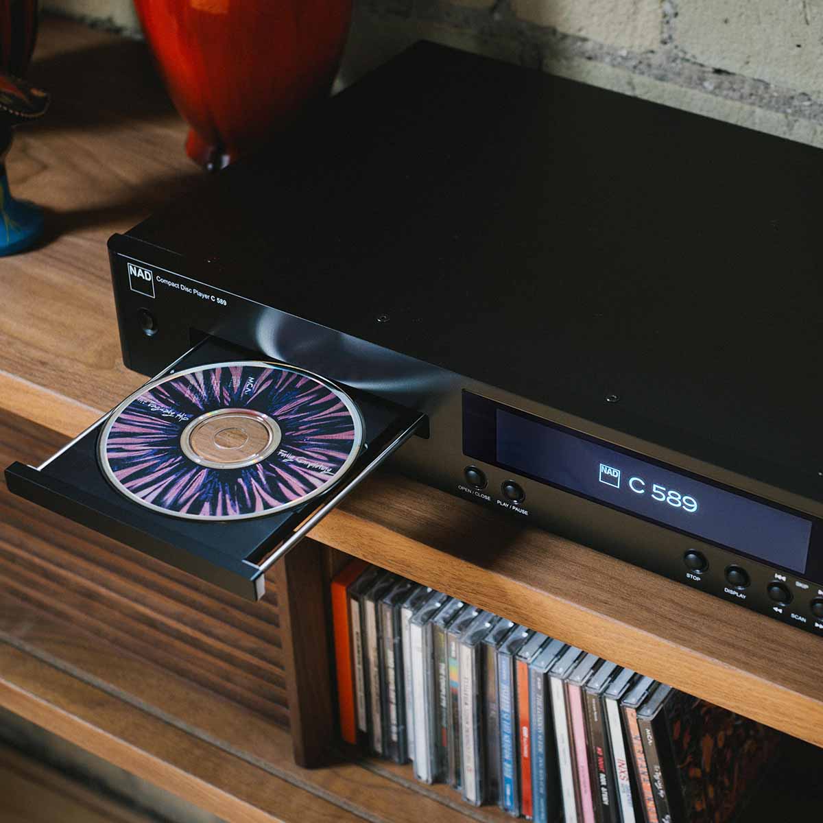 NAD C 589 CD Player - lifestyle photo high angle photo of disc sitting in open tray