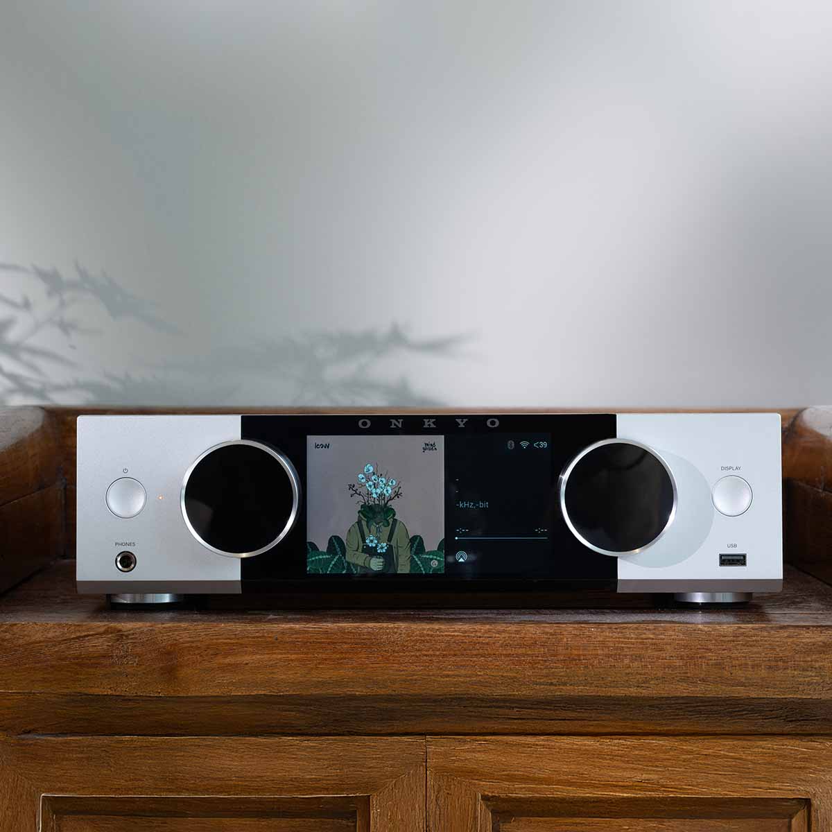 Onkyo Muse Y-40 Network Integrated Amplifier - Silver - lifestyle photo of unit on cabinet