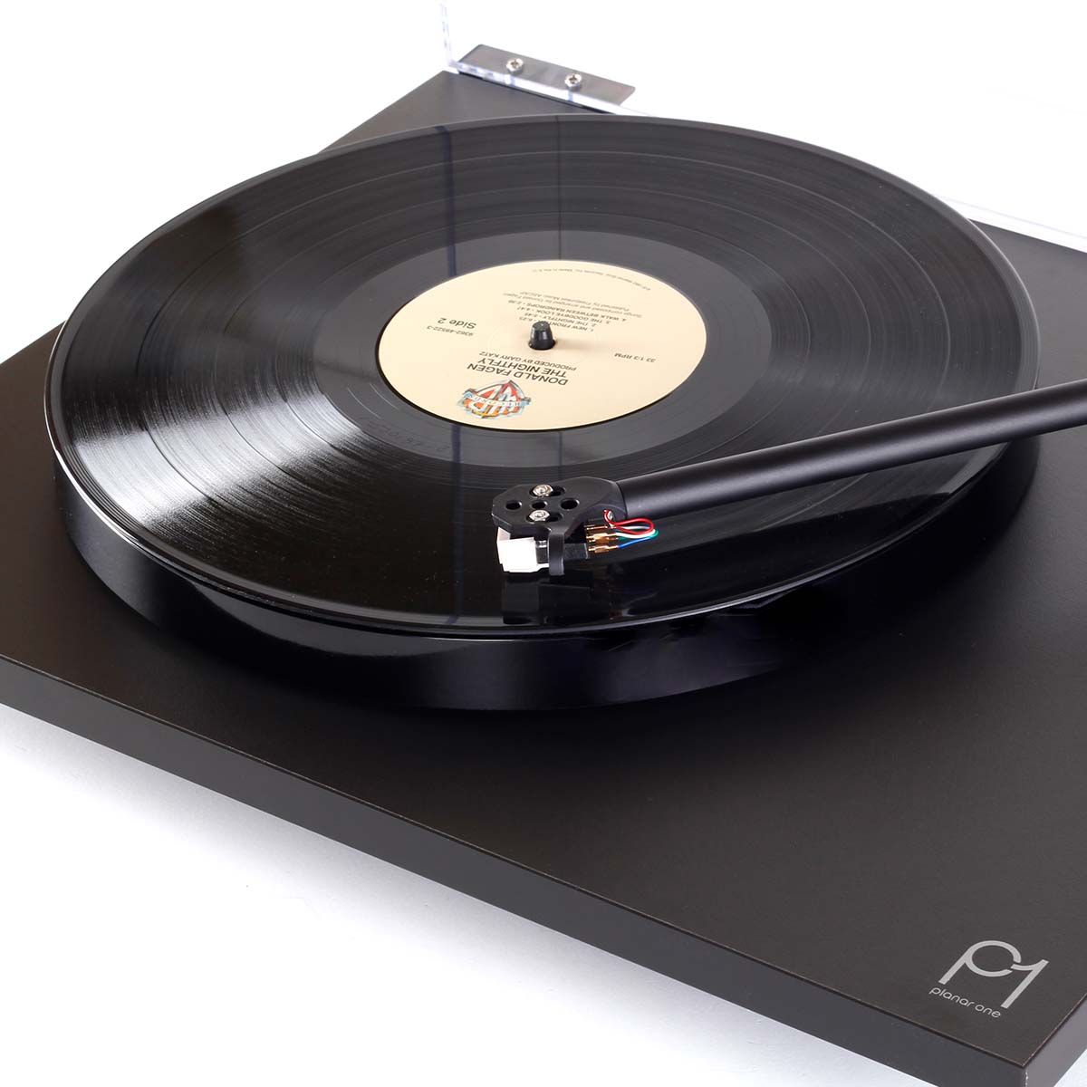 Rega Planar 1 Turntable - black - front close-up view angled left with no dust cover, record on platter and tone arm engaged