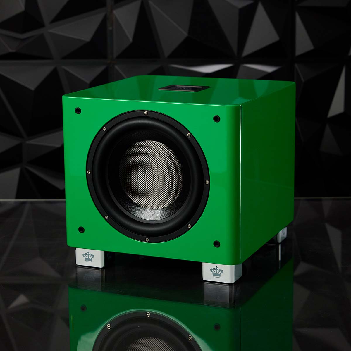 REL Acoustics T/9x SE Subwoofer Green unit without grille in front of black textured background angled left