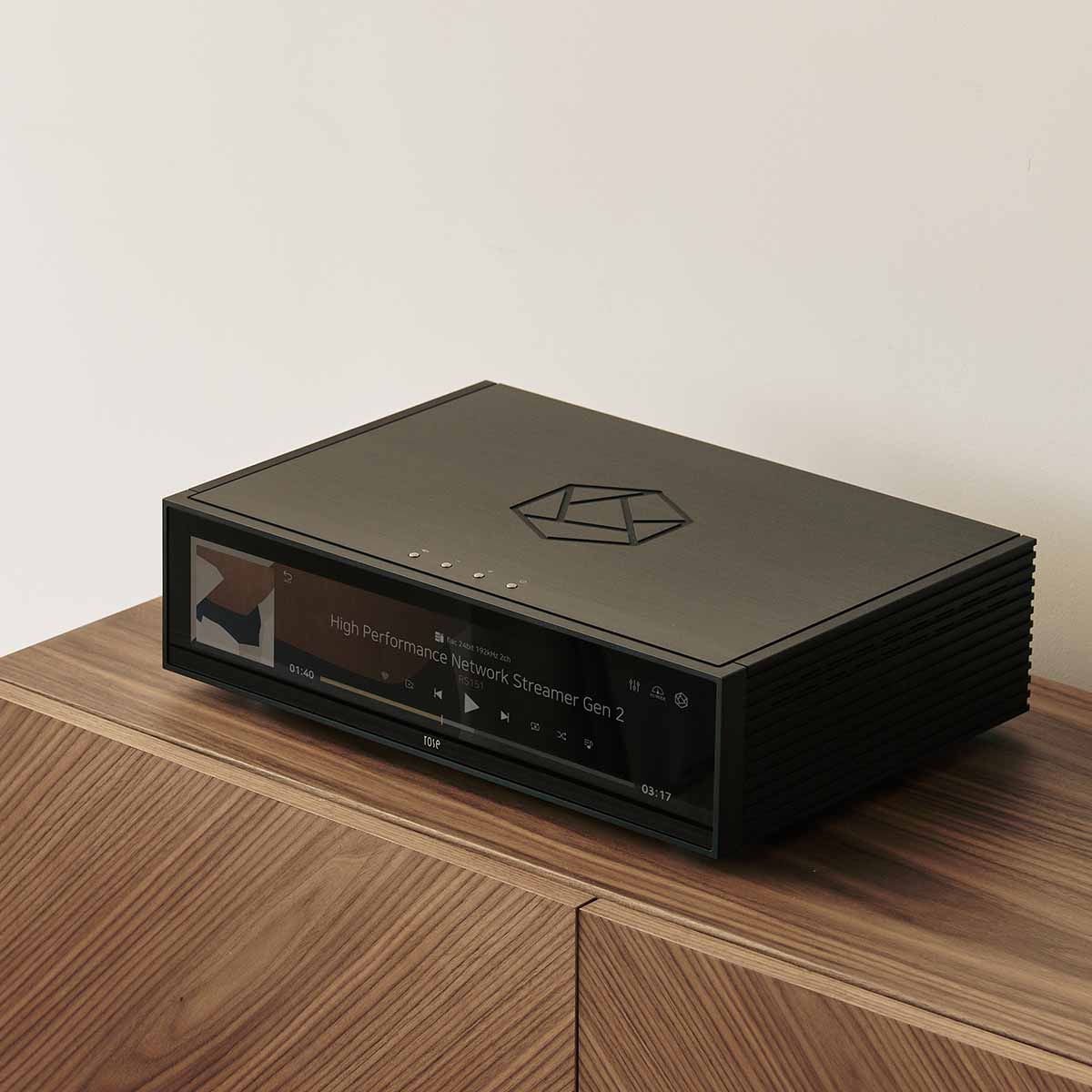 HiFi Rose RS151 High Performance Network Streamer Gen 2 - Black - top and front view angled left lifestyle shot of unit on cabinet