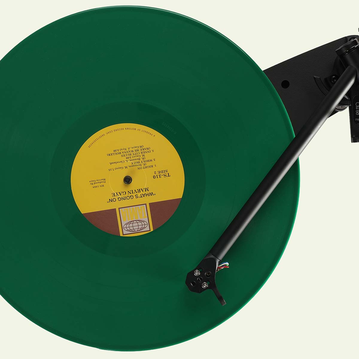 Rega Replay Turntable - top view with green record on platter