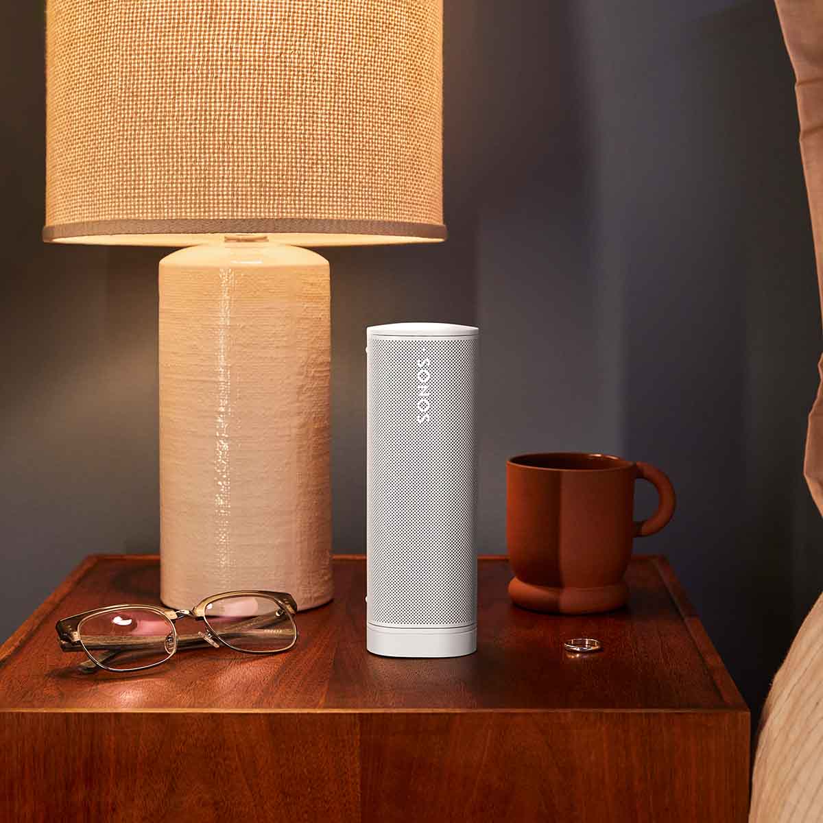 Sonos Roam 2 Portable Waterproof Smart Speaker - white - lifestyle photo speaker on nightstand