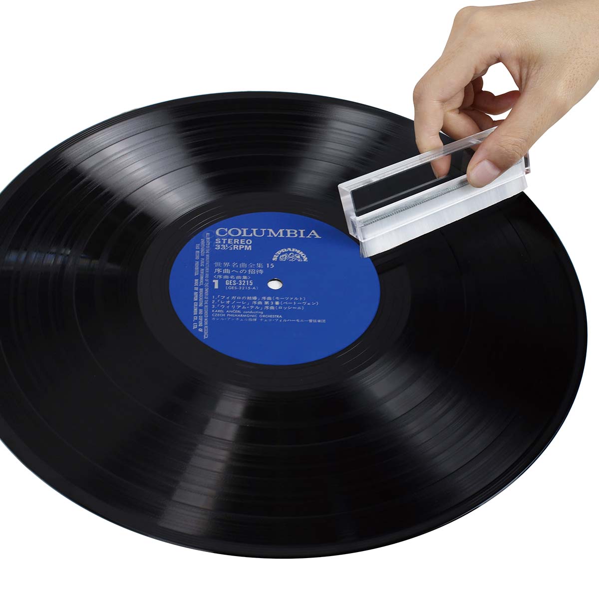 Lenco TTA-12IN1PRO Professional 12-in-1 Turntable Setup and Record Cleaning Kit record brush being used on a record