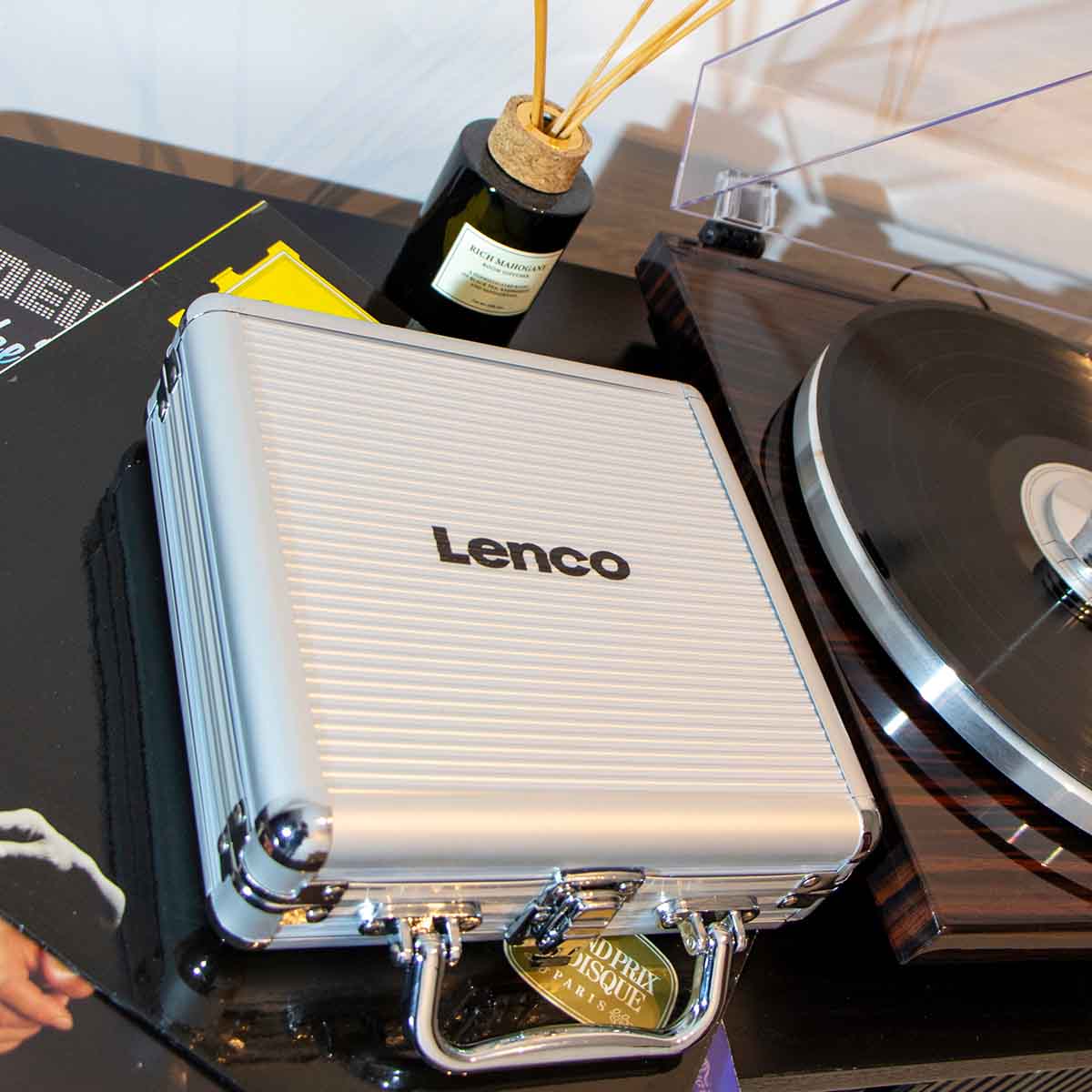 Lenco TTA-12IN1PRO Professional 12-in-1 Turntable Setup and Record Cleaning Kit closed case on shelf to left of record player