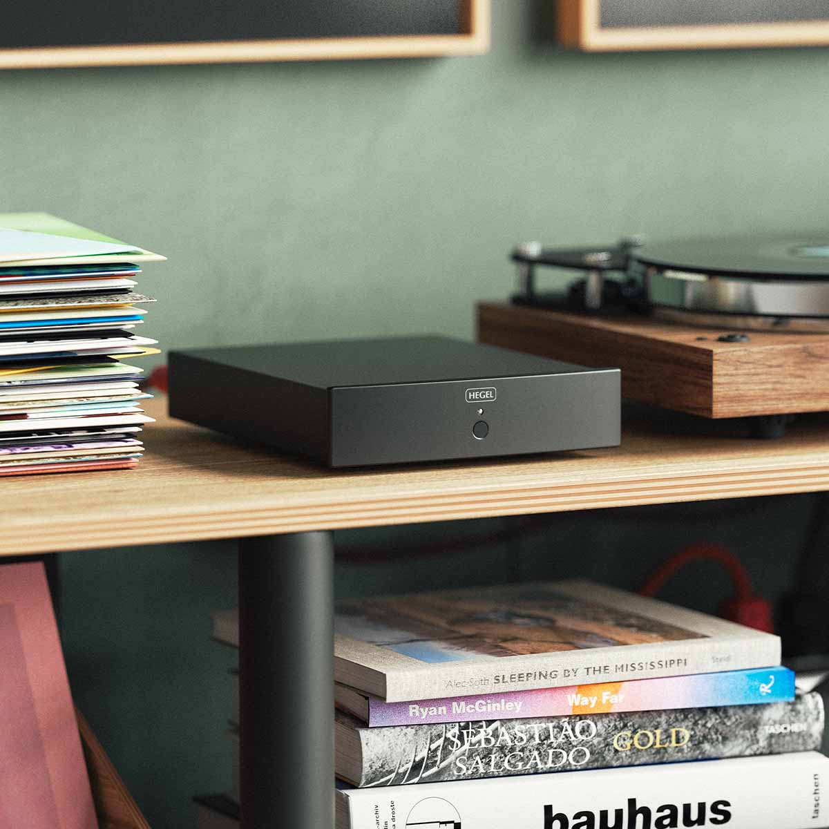 Hegel V10 Phono Preamplifier lifestyle shot of unit on cabinet close-up