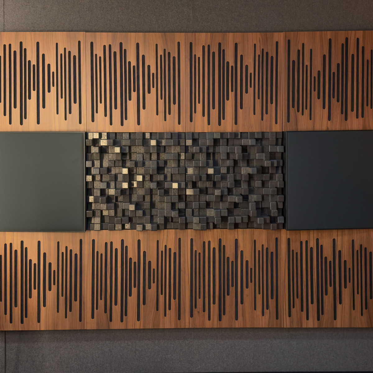 Modern wall art panel featuring a Vicoustic Cinema Multifuser DC4 Acoustic Diffuser Panel flanked by two matte black panels, with wooden borders on top and bottom decorated with vertical black linear patterns.