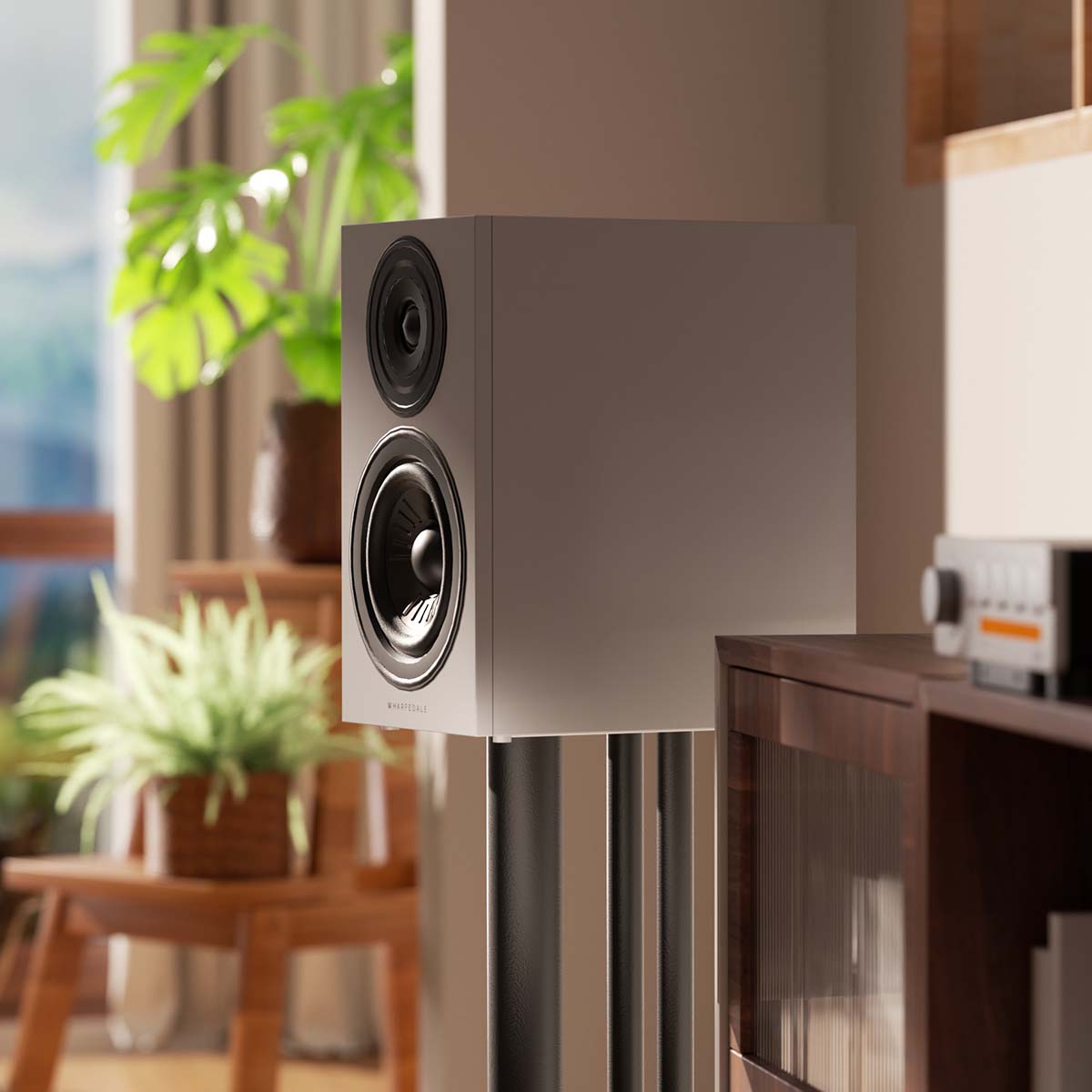 Wharfedale Diamond 12.2i 2-Way Bookshelf Speakers - single grey speaker lifestyle photo side view facing left without grille