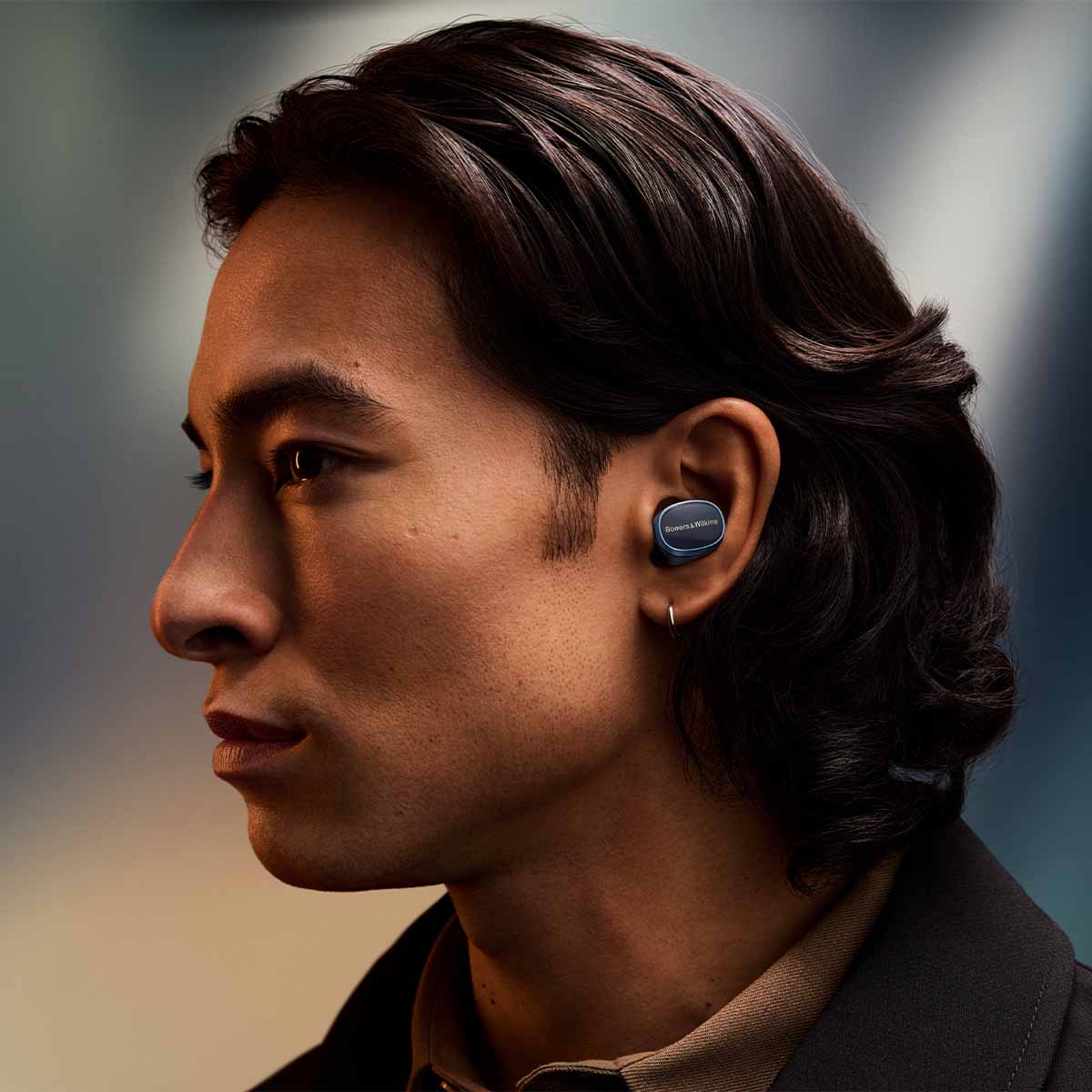 Bowers & Wilkins Pi8 Wireless Earbuds male lifestyle